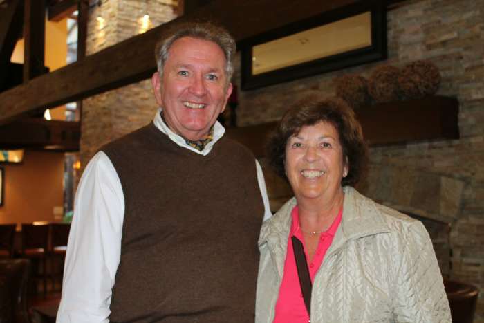 Cruise Specialists host Tom Mullens paused a conversation with a guest for a photo.