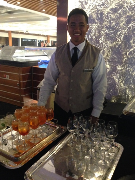 cruise ship staff with champagne