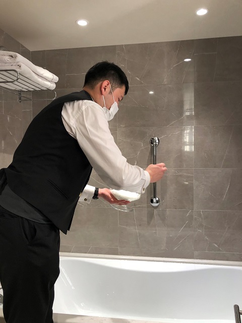 butler preparing bath