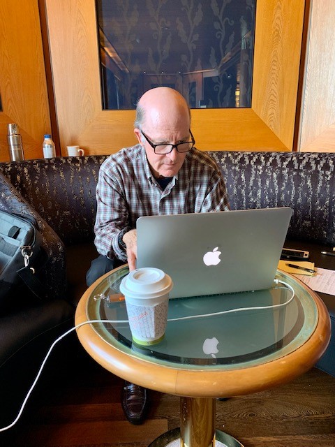 man working at laptop