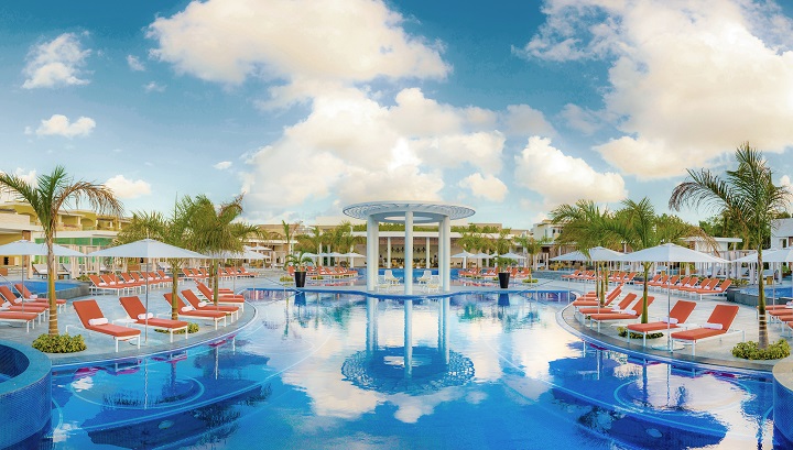 elegant resort pool and deck chairs