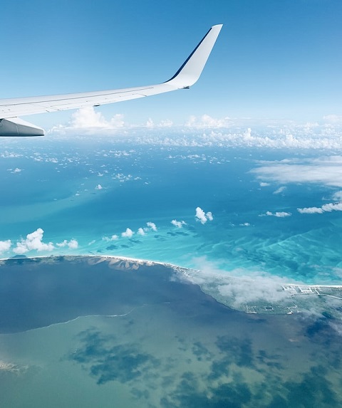 tropical beach view from airplane
