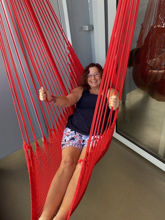Woman in red hammock