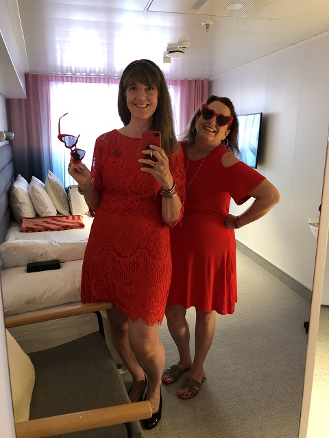 women in red dresses
