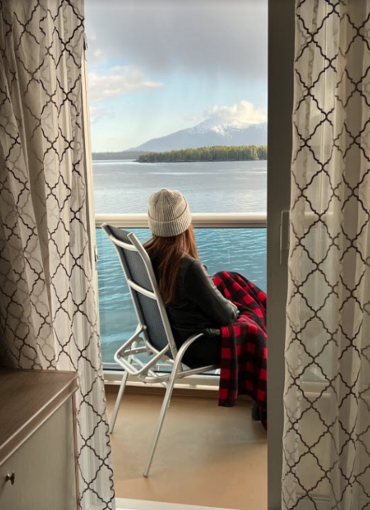 sitting on a cruise ship balcony