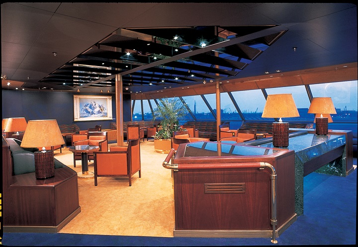 lounge with windows on board cruise ship
