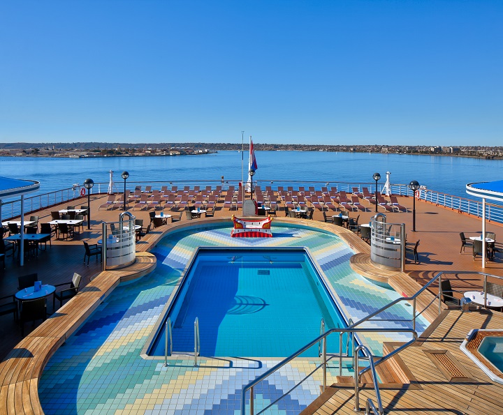 pool on board ship with ocean in background